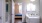 a bathroom with a bed and sink