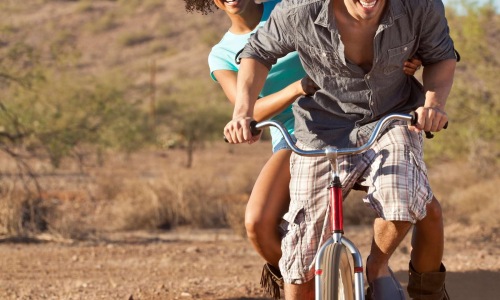 people riding a bike