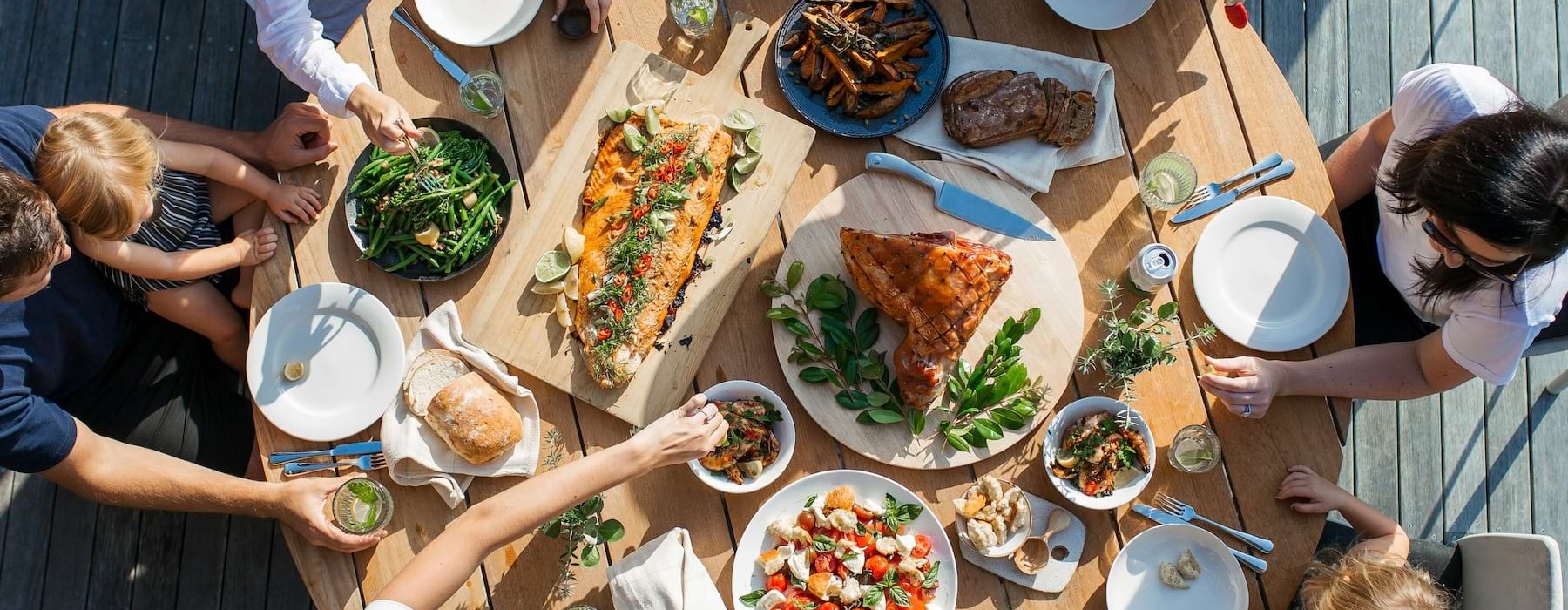 table with food and people