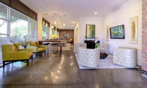 a large living room with a large glass door
