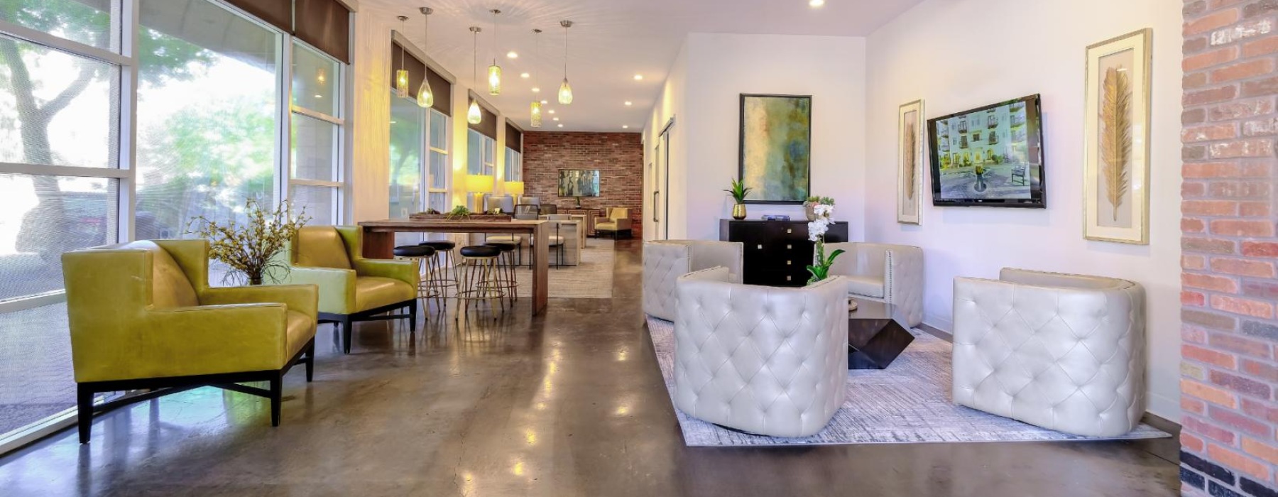 a large living room with a large glass door