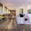 a large living room with a large glass door